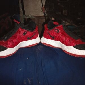 Red, black & white Nike PG 4 basketball shoes size 4.5 youth